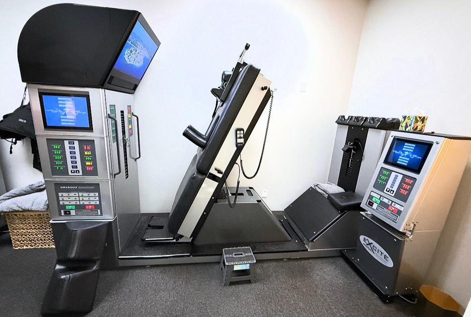 Travis Chiropractic In Tulsa treatment room with Spinal Decompression table