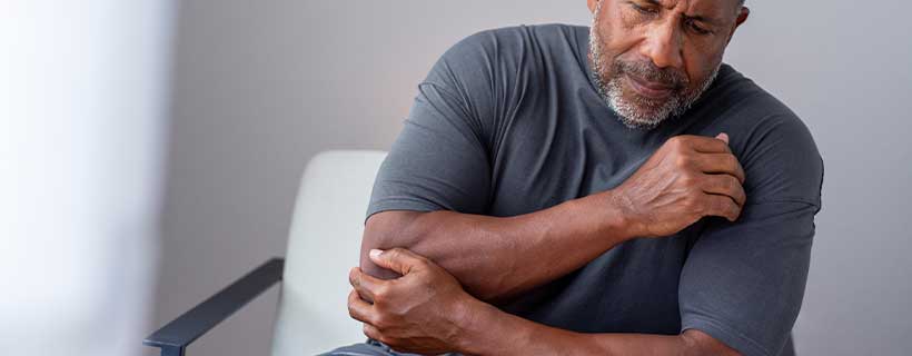 patient needing elbow pain treatment in Tulsa