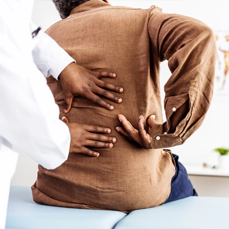 Chiropractic Tulsa OK Woman With Back Pain